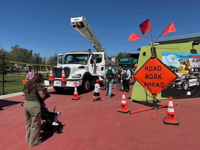 Families at a touch-a-truck event