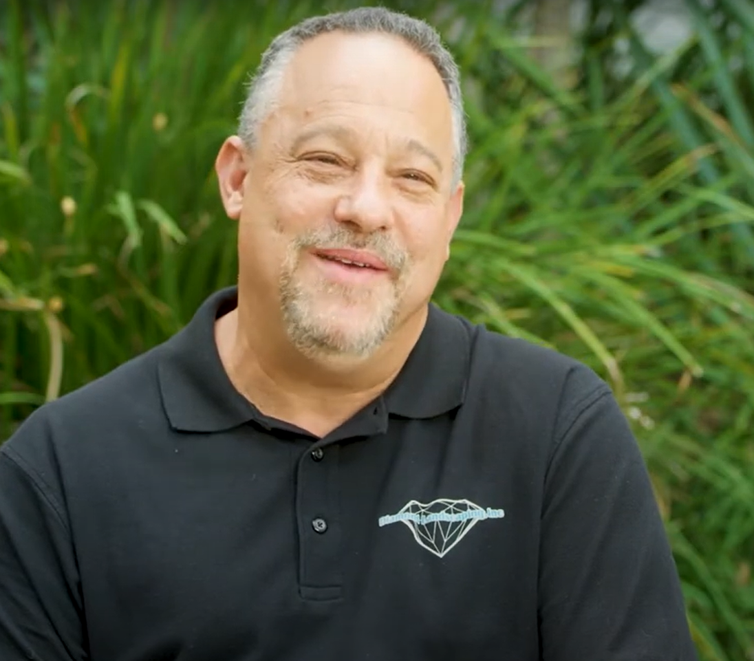 A headshot of a person named Brian Diamond.