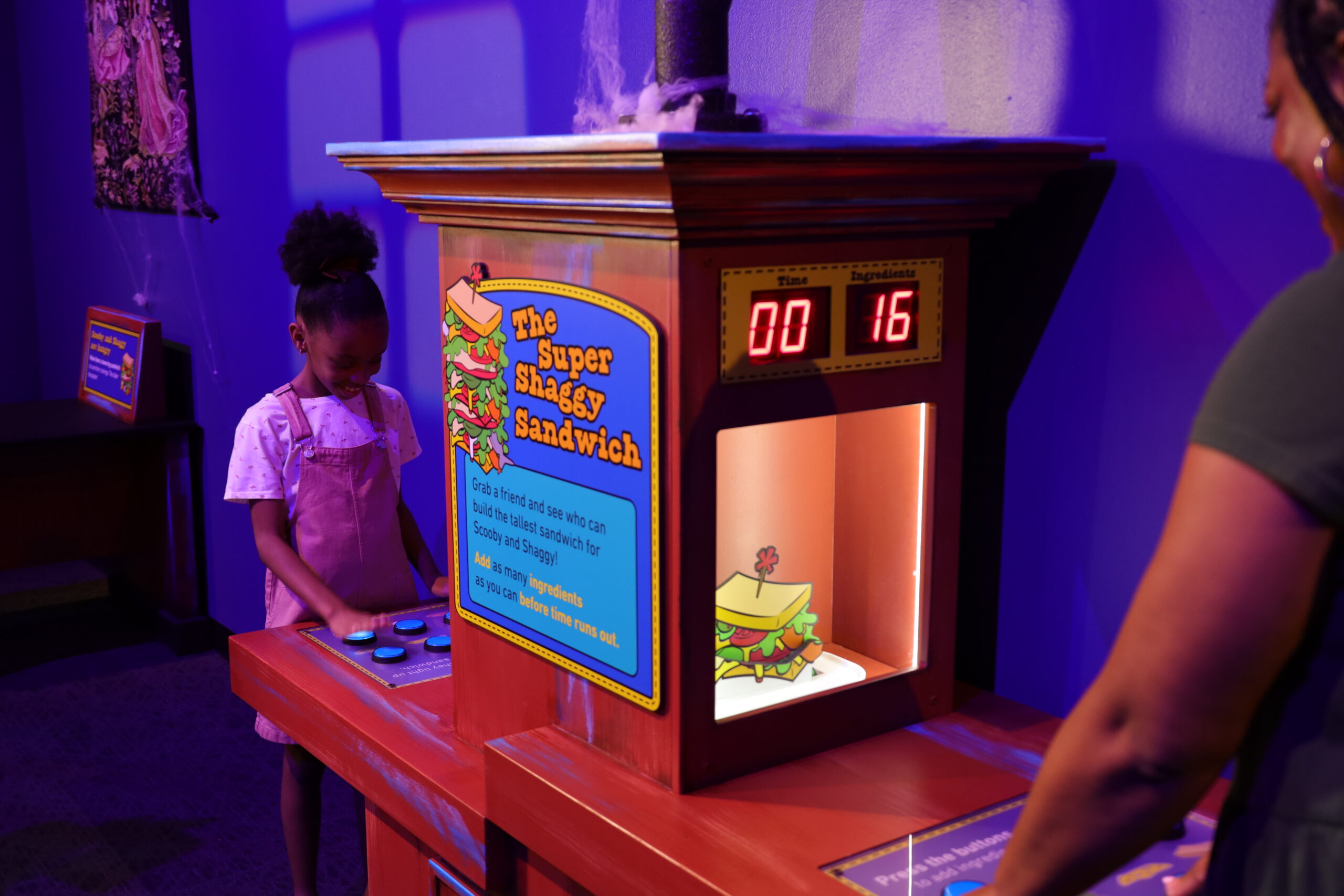 A family enjoying a museum exhibit.
