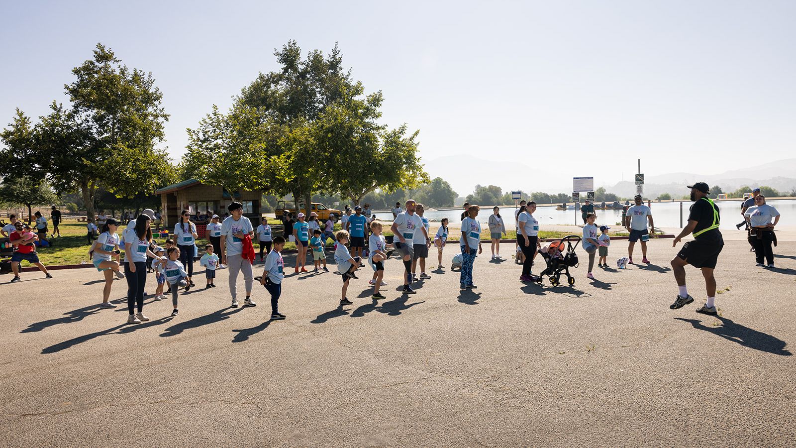 Participants stretching for a family fun run.