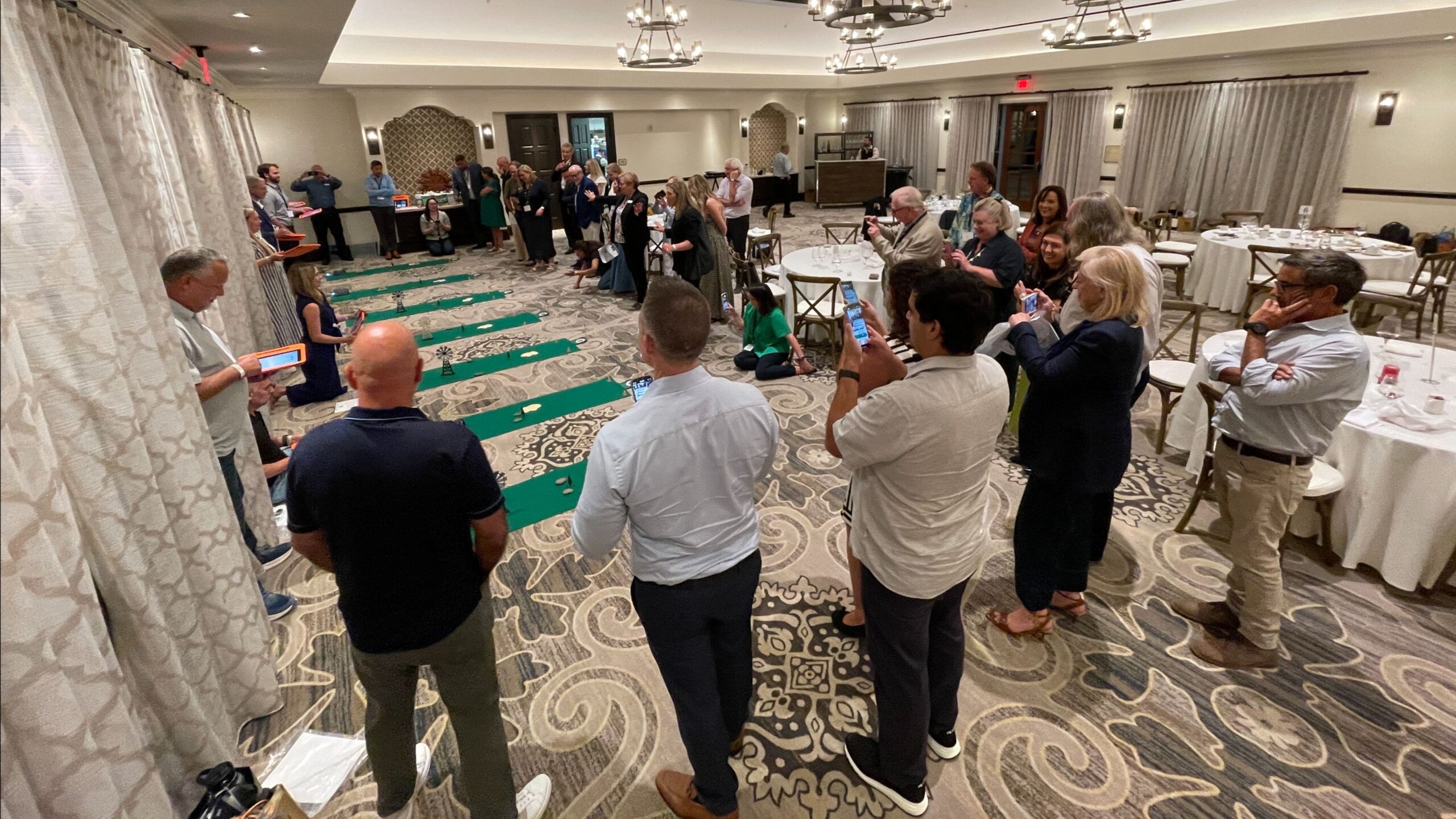 Board members at a retreat playing games.