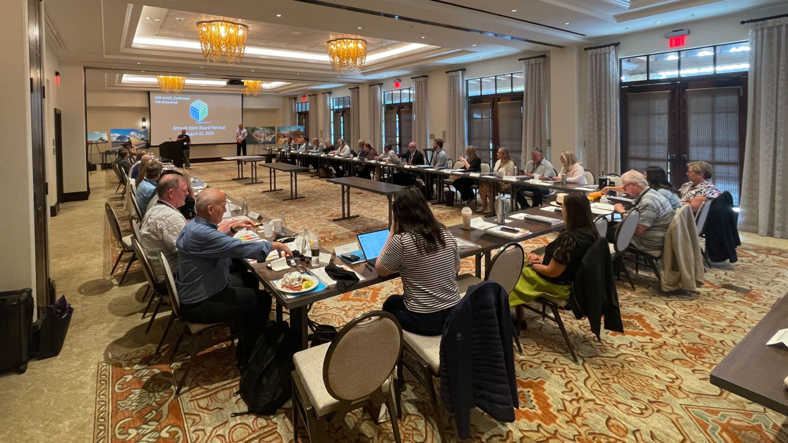 Board members at a table discussion for a retreat.