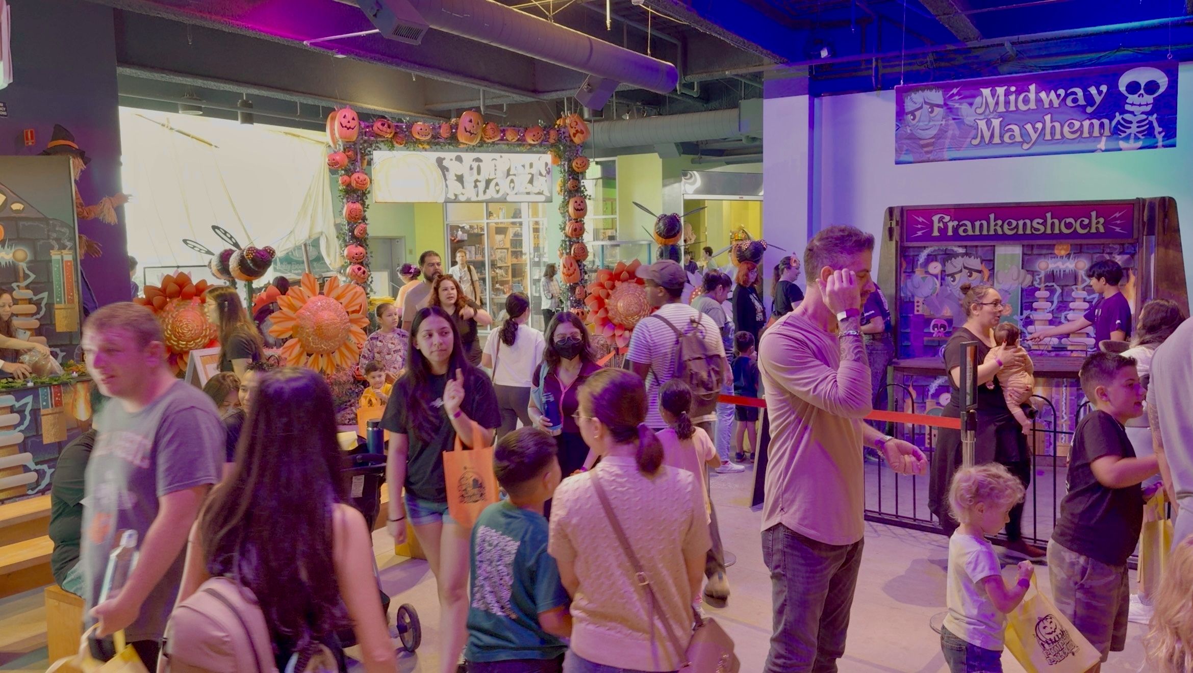 Families gathering Pumpkin Palooza event at Discovery Cube Orange County.